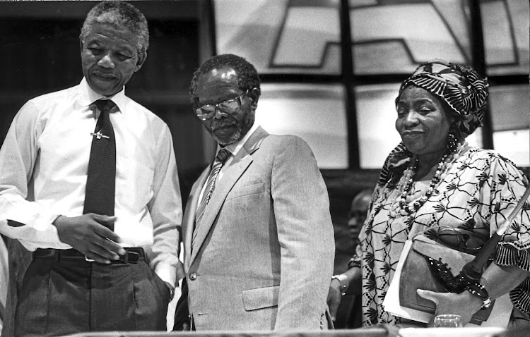 Nelson Mandela with Oliver and Adelaide Tambo.