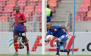 Thokozani Sekotlong of Chippa United and Jackson Mabokgwane of Bloemfontein Celtic during the Absa Premiership match between Bloemfontein Celtic and Chippa United at Nelson Mandela Bay Stadium on January 19, 2020 in Port Elizabeth, South Africa. 