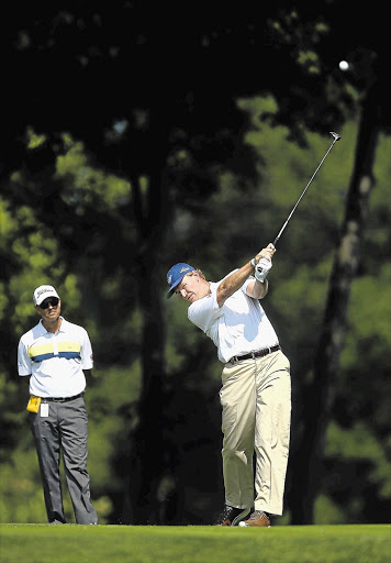 TAKING IT EASY: Ernie Els practises prior to the PGA Championship at Valhalla Golf Club in Kentucky. Tiger Woods's participation is in question due to injury