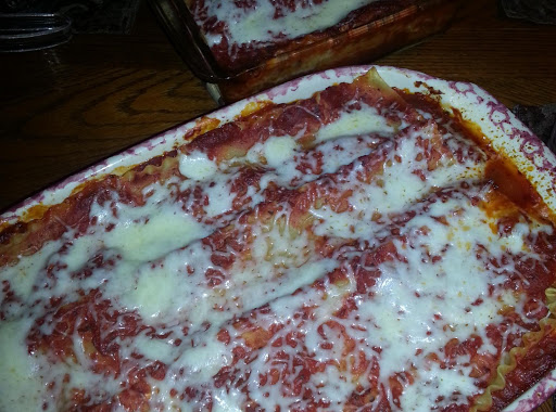 Delicious lasagna with meat I made tonight. Behind is the vegetarian lasagna for my daughter.