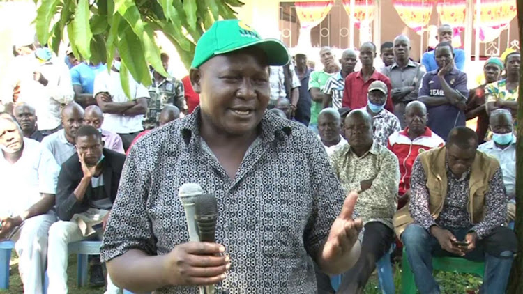 UDA candidate Alex Lanya campaigns at Ejinja market on Saturday