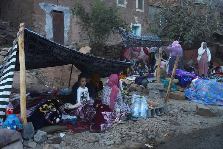 People camp on the roadside in the aftermath of a deadly earthquake in Imgdal, Morocco. Picture: REUTERS/HANNAH MCKAY.