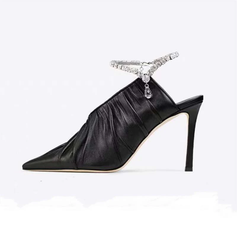 Escarpins à talons hauts à bout pointu et strass dignes et élégants pour femmes, idéaux pour les soirées et occasions spéciales.