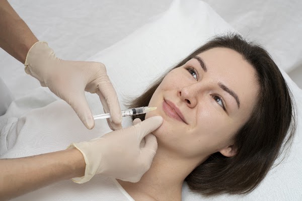 Clean, professional medical spa treatment room with neutral tones at Real Medical Spa And Aesthetics in Florence