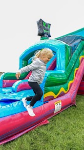 Girl playing in backyard party