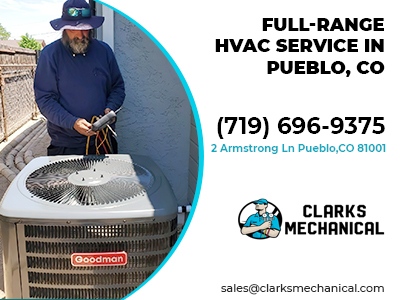 A man with a multimeter next to a banner that reads: Full-Range HVAC Service in Pueblo