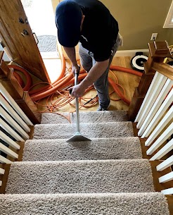 Staircase carpet drying with fans on each step