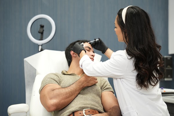 Clean, professional medical spa treatment room with neutral tones at Serotonin Anti Aging Springfield in Springfield