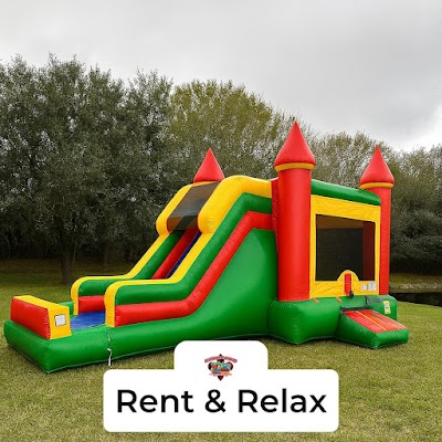 Bounce House Setup In Grassy Field