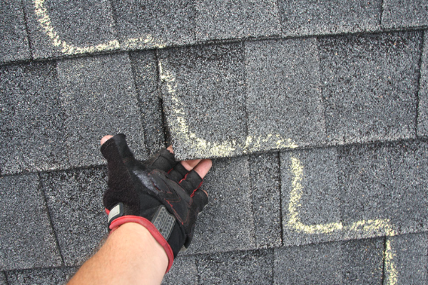 Storm-related roofing work shared in a recent public business post