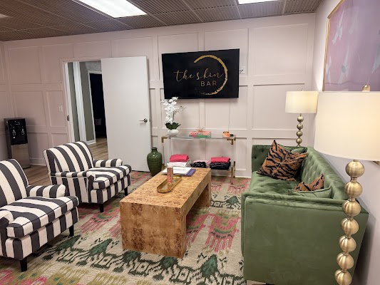 Clean, professional medical spa treatment room with neutral tones at The Skin Bar in Matthews