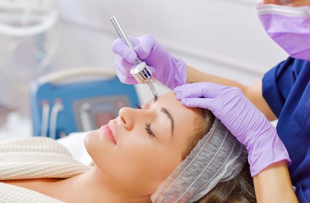 Clean, professional medical spa treatment room with neutral tones at The Aesthetics Studio in Shelby Township