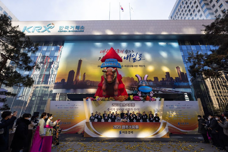 Attendees during a ceremony marking the first day of trading of the year at the Korea Exchange in Seoul, South Korea. Picture: SEONGJOON CHO/BLOOMBERG