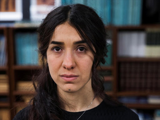 FILE PHOTO: Yazidi survivor Nadia Murad poses for a portrait at United Nations headquarters in New York, U.S., March 9, 2017. REUTERS