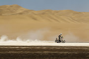 Pierre Cherpin of France rides his KTM on stage 13 of the 2012 Dakar Rally from Nasca to Pisco on January 14 2012 in Pisco, Peru.