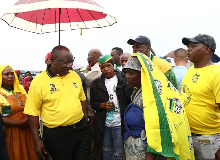 President Cyril Ramaphosa and Cosatu president Zingiswa Losi listen to Bulawa Nxamashe talk about a lack of service from the municipality during a walk about in Pampierstad, Northern Cape, ahead of the ANC's anniversary celebrations in January. In his weekly newsletter, the president said there should be consequences for all those in the public service who do not do their work. File photo.