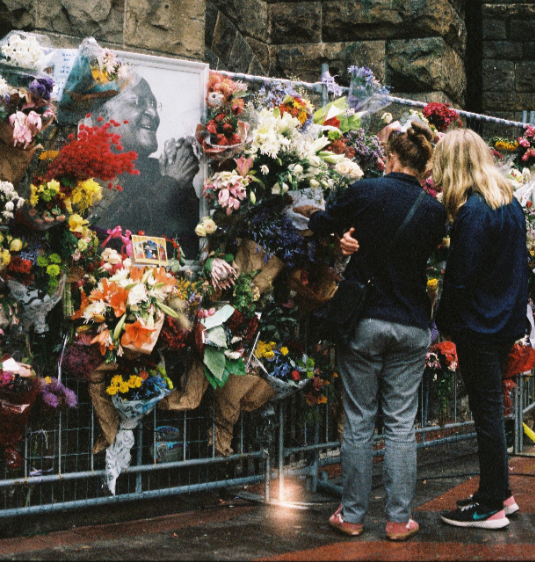 Mourners pay their respects to Archbishop Desmond Tutu at St George's Cathedral in Cape Town on December 30 2021.