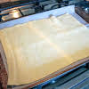 Thumbnail For Pizza Dough On A Cookie Sheet.