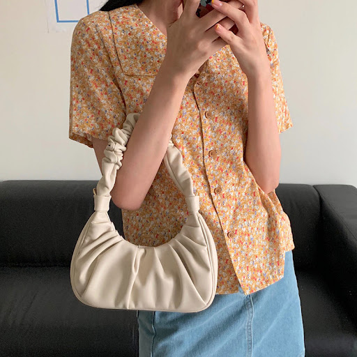 Title 2, The New Armpit Bag Folds