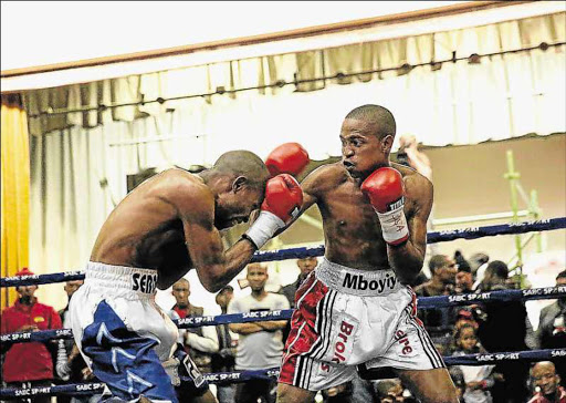 FISTS OF FURY: Aphiwe Mboyiya, right, seen here in action against Jasper Seroka, will take on Jerry Castroverde tonight Picture: MARK ANDREWS