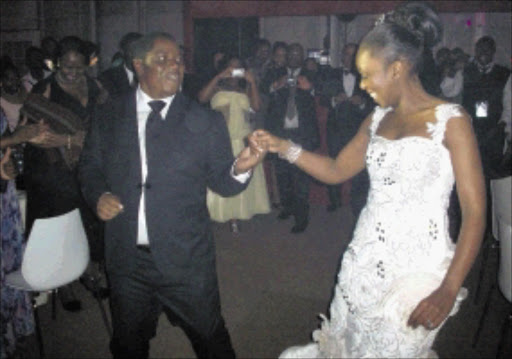 MEMORABLE: Robert Gumede dances with wife Portia at their wedding reception. Pic: Riot Hlatshwayo. 21/03/2010. © Sowetan.