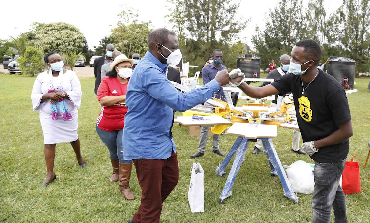 Deputy President William Ruto when he distributed assortment of equipment to 30 youth and women groups from Embakasi East, Embakasi South, Dagoretti North and Kamukunji constituencies in Karen, Nairobi County on July 2, 2020.