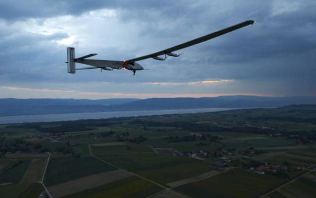 erman test pilot Markus Scherdel steers the solar-powered Solar Impulse 2 aircraft for its maiden flight at its base in Payerne, Switzerland on Monday.