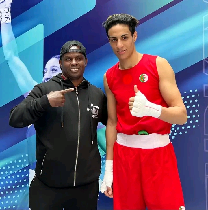 Boxing Federation of Kenya communications director Dancun Kuria poses with Algerian pugilist Imane Khelif at the World Women's Boxing Championships in Istanbul Turkey.