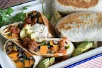 Spinach, Sweet Potato & Black Bean Burritos was pinched from <a href="http://oatandsesame.com/2015/04/spinach-sweet-potato-black-bean-burritos/" target="_blank">oatandsesame.com.</a>