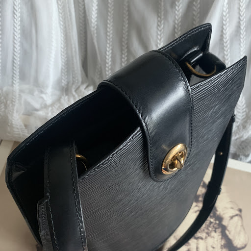 Louis Vuitton Vintage Cluny Black Epi Leather Bucket Shoulder Bag –  Amarcord Vintage Fashion