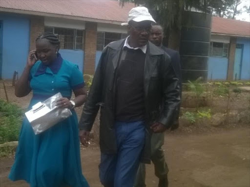 MP aspirant Eliud Owalo when he arrived to cast his vote at Kibra constituency, April 30, 2017. /COURTESY