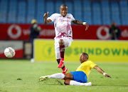 Thabo Matlaba of Swallows tackled by Andile Jali of Mamelodi Sundowns during the DStv Premiership 2021/22 match between Mamelodi Sundowns and Swallows at Loftus Versfeld Stadium, Pretoria, on 03 October 2021.