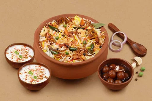 1 KG Veg Nawabi Matka Biryani + FREE Dessert