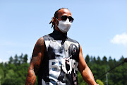 Lewis Hamilton walks in the paddock ahead of the F1 Grand Prix of Styria at Red Bull Ring on June 24 2021 in Spielberg, Austria.