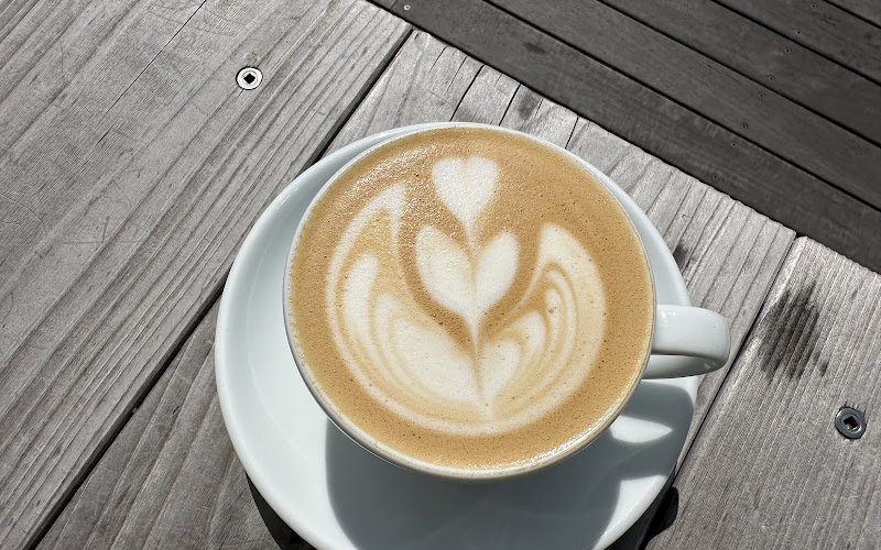 POUR specialty coffee (a new big store in the arcade .)
