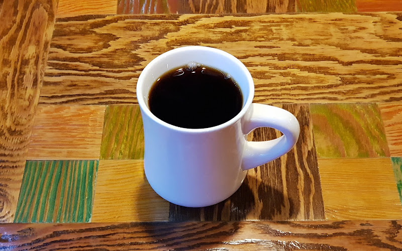 MEN IN THE COFFEE