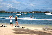 Waterskiing at Club Med La Pointe aux Canonniers. Club Med is big on sport, with affable staff members on hand to guide you through activities from tennis to archery, yoga, snorkelling and scuba diving, among may others.