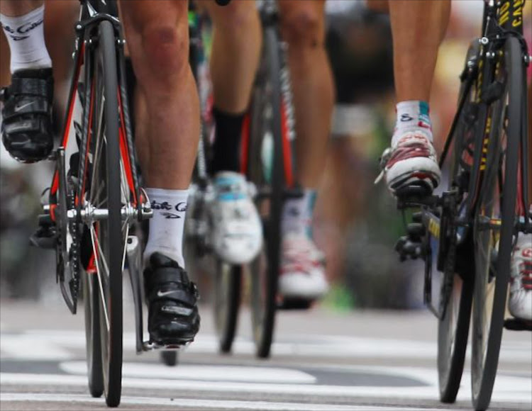 A female cyclist was stopped mid-race after almost catching up with the men.