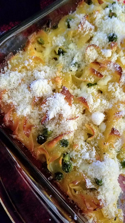 This Savory Cheese Kugel Recipe is my take on the Jewish casserole with egg noodles, butter, eggs, and cheese, with other optional add ins like here, peas and sauteed onions