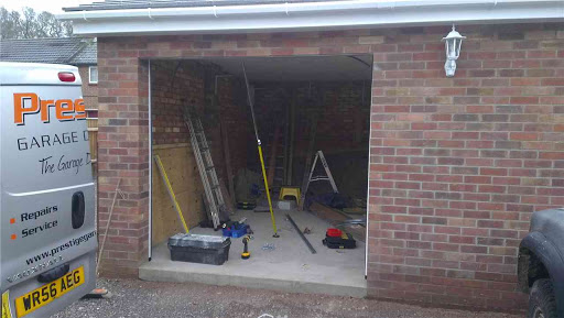 Sectional garage doors with electric operator