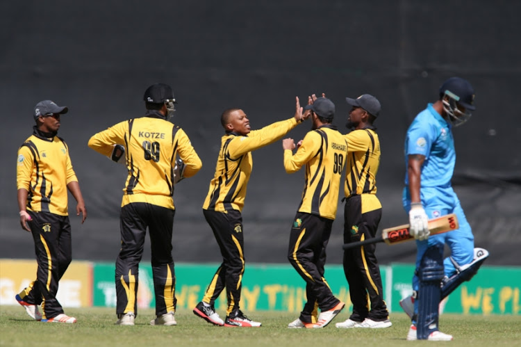 Nkululeko Serame of Boland is congratulated for getting Patrick Kruger of Northern Cape wicket during the 2018 Africa T20 Cup match between Boland and Northern Cape at Eurolux Boland Park on September 16, 2018 in Paarl, South Africa.