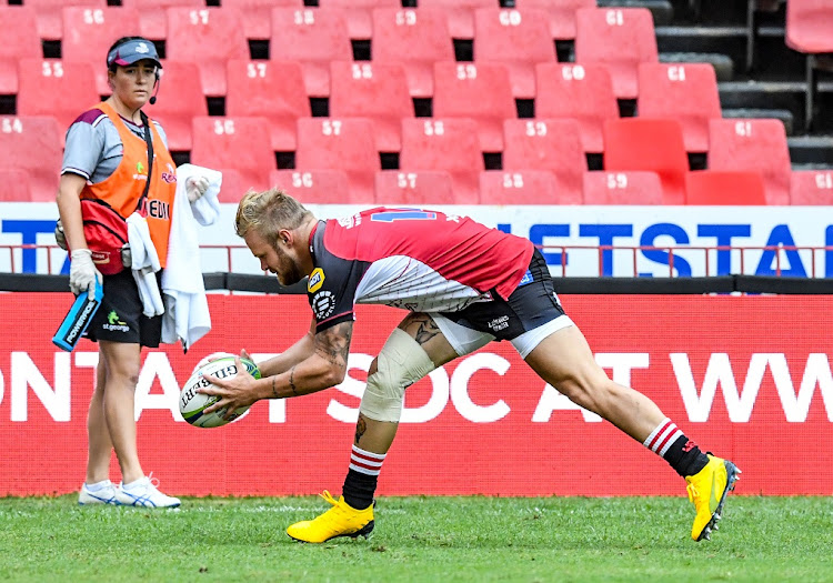 Tyrone Green of the Lions scores a try during the Super Rugby match against the Reds at Ellis Park on Saturday, February 8.