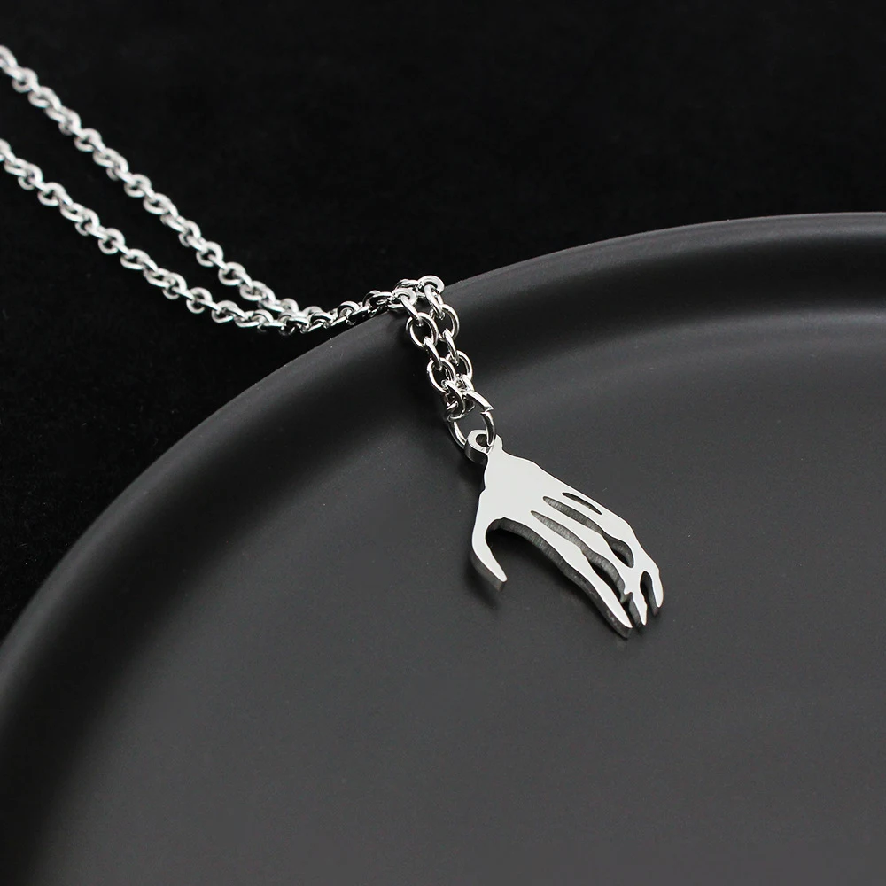 Title 4, Collier couple en acier inoxydable avec mains d...