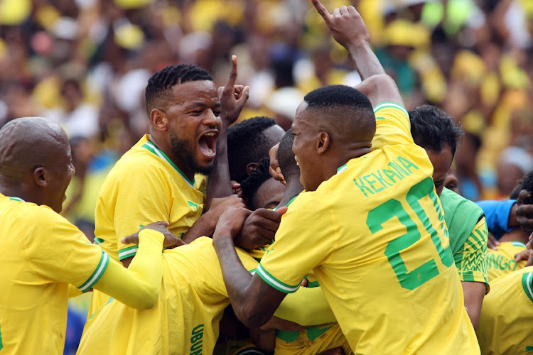 Mamelodi Sundowns players celebrate during their Caf Champions League victory against Al Ahly at Loftus Stadium in Pretoria on March 11 2023.