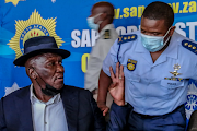 Police minister Bheki Cele with KZN provincial commissioner Nhlanhla Mkhwanazi at a briefing on political killings in Durban on Wednesday.