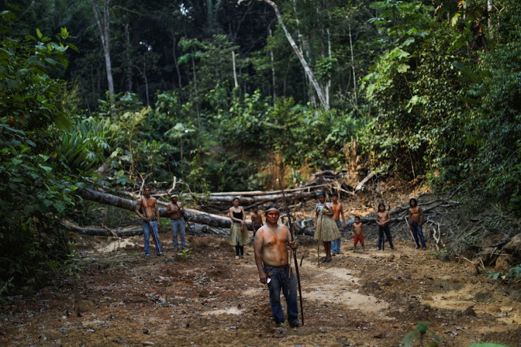 Indigenous Mura people pose for a picture in a deforested area of the Amazon rainforest near Humaita, Brazil, August 20 2019. Picture: UESLEI MARCELINO/REUTERS