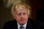 British Prime Minister Boris Johnson says the Russian leader will be condemned by the world and by history for his invasion, 'never able to cleanse the blood of Ukraine from his hands'. File photo.