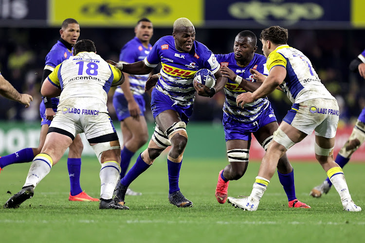 Stormers players Hacjivah Dayimani battling it out with Davit Kubriashvili and Alexandre Fischer of ASM Clermont Auvergne during their Heineken Champions Cup Round 1 Pool B, Stade Marcel-Michelin, France - 10 Dec 2022.