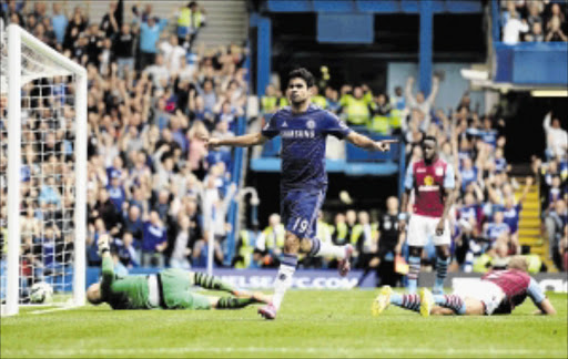 HAMSTRUNG: Chelsea marksman Diego Costa celebrates after scoring against Aston Villa at Stamford Bridge Photo: Jamie McDonald/Getty Images