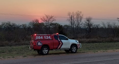 ER24 paramedics rush a 36-year-old woman to an airport where she can be airlifted to hospital after she suffered a heart attack while on holiday in the Kruger National Park.